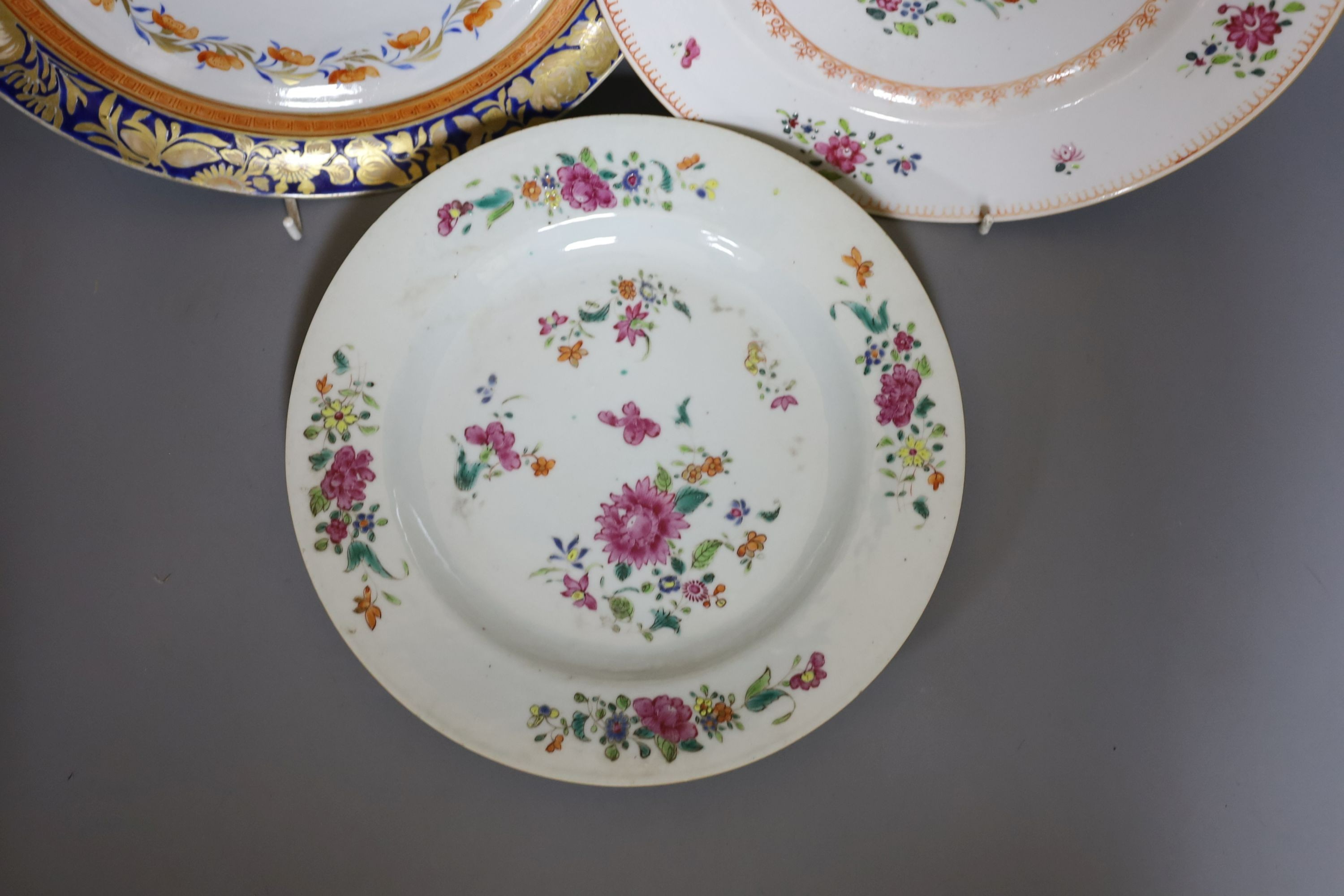 An early 19th century Chinese enamelled porcelain plate and two 18th-century Chinese export famille rose plates (3) largest 24.5cm diameter